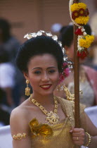 Portrait of young woman marching in the Flower Festival parade