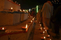 Deep Divali Festival. Oil lamps and crowds line the steps of the Ghats leading down to the Ganges River