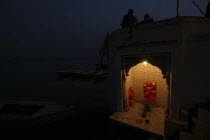 Near Hanuman Ghat. A Hanuman Shrine on the Ganges River at night