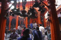 Kala Bhairava Temple. Temple interior with bells and worshippers