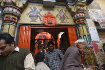 Worshippers enter and leave Kala Bhairava Temple