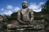 The Vatadage. Seated Buddha statue within the quadrangle