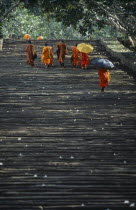 Monks climbing the steep steps