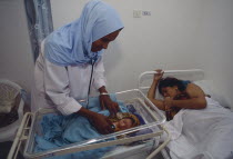 Nurse attending new born baby in the Edna Adan maternity hospital.