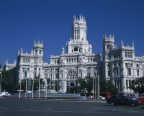Plaza Cibeles. View of exterior from across road with traffic.