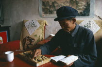 Farner using an abacus to do his accounts.