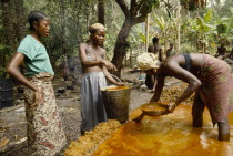 Women processing Palm Oil
