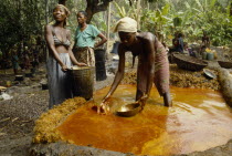 Women processing Palm Oil.
