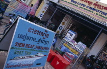Boat trip sign on the pavement outside an Internet cafeAsian Bar Bistro Cambodian Kampuchea Restaurant Southeast Asia Holidaymakers Inn Kamphuchea Pub Tavern Tourism Tourist Public House Sightseeing...