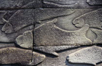 The Bayon.  Bas relief carvings on the south wall depicting everyday scenes.  Fishmarket.Asian Cambodian Kampuchea Southeast Asia History Kamphuchea