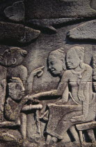 The Bayon.  Bas relief carvings on the south wall depicting everyday scenes.  Fishmarket.Asian Cambodian Kampuchea Southeast Asia History Kamphuchea