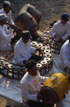 Traditional Khmer percusionists accompanying shaman ceremonyAsian Cambodian Kampuchea Religion Southeast Asia Classic Classical Historical Kamphuchea Older Religious History