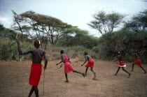 Masai Moran practising hunting skills.