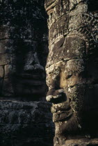 Bayon Temple details of two of the four faced towersAsian Cambodian Kampuchea Religion Southeast Asia 2 4 History Kamphuchea Religious