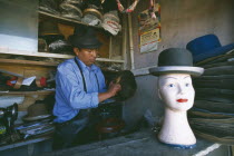 La Ceja.  Hatmaker making traditional bowler style hats.