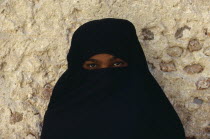 Portrait of veiled woman.
