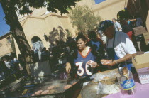 Making burgers in San Felipe de Neri church grounds in the old town plaza