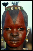 Dinka girl decorated with Liria on a Tifta or face paint