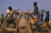 Fulani women drawing water at a well