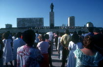 Memorial Day crowds below a towering statue of Che Guevara at the battle site memorial