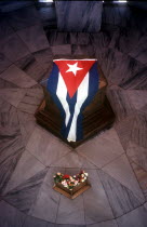 The tomb of Jose marti with the Cuban flag draped over it