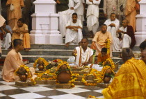 Monks and worshippers on temple steps. Dirwali festival.