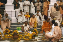 Monks and worshippers on temple steps.Dirwali festival.