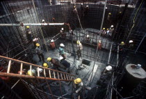 Men working on construction of the dam