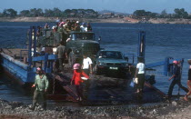 Motor ferry from Phnom Pehn to Kampong Cham with truck   car and foot passengers.