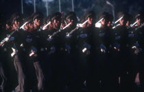 Line of soldiers on parade armed with bayonets.