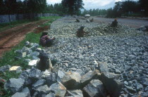 People working along the road to Pegu from Taukkyan near Yangon.