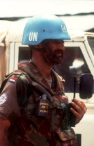 UN soldier in the contested North West.  Head and shoulders in profile to the right.