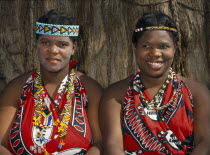 Local women in traditional tribal dress and head bands.