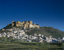 The Crusader Castle on hilltop  village below & surrounding