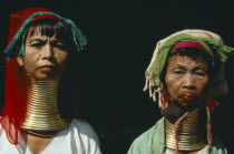 Padaung women refugees from Myanmar with their necks encased in traditional rings.