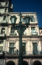 Ornate lamp and old building detail