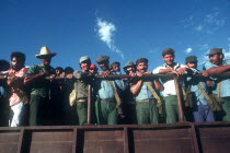 Militia men on the back of a truck