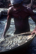 Gem miner panning for gems