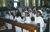 Young girls attending first communion.