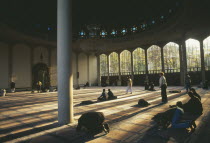 Muslims at prayer inside mosque in Regents Park.