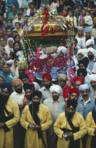 Sikh worshippers at celebration for inauguration of new temple.