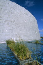 Exterior view of the Library which has been resurrected on the site of the Bibliotheca Alexandrina with scripts of the worlds major civilizations engraved on the walls