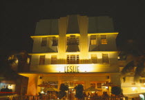 South Beach. Ocean Drive Art Deco Buildings at night Leslie Building & diners in restaurant