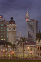 City centre skyline from Merdeka Square with The Sultan Abdul Samad Building in the foreground The Menara Kuala Lumpur  and Petronis Towers behind.Center KL Tower