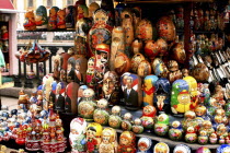Display of traditional and modern themed Russian Matryoshka Dolls for sale on a market stall
