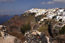 Town atop rugged coastal cliffsThira Fira Santorini