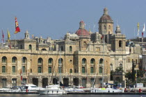 View of moored yachts in the harbour and waterfront architecture