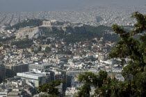 Aerial view over the city toward the Acropolis