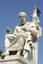 Statue of bearded man in robes at the Athens AcademyUniversity