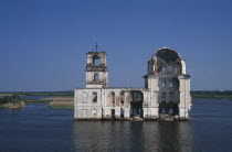 Ruined remains of drowned church in stretch of the River Volga.